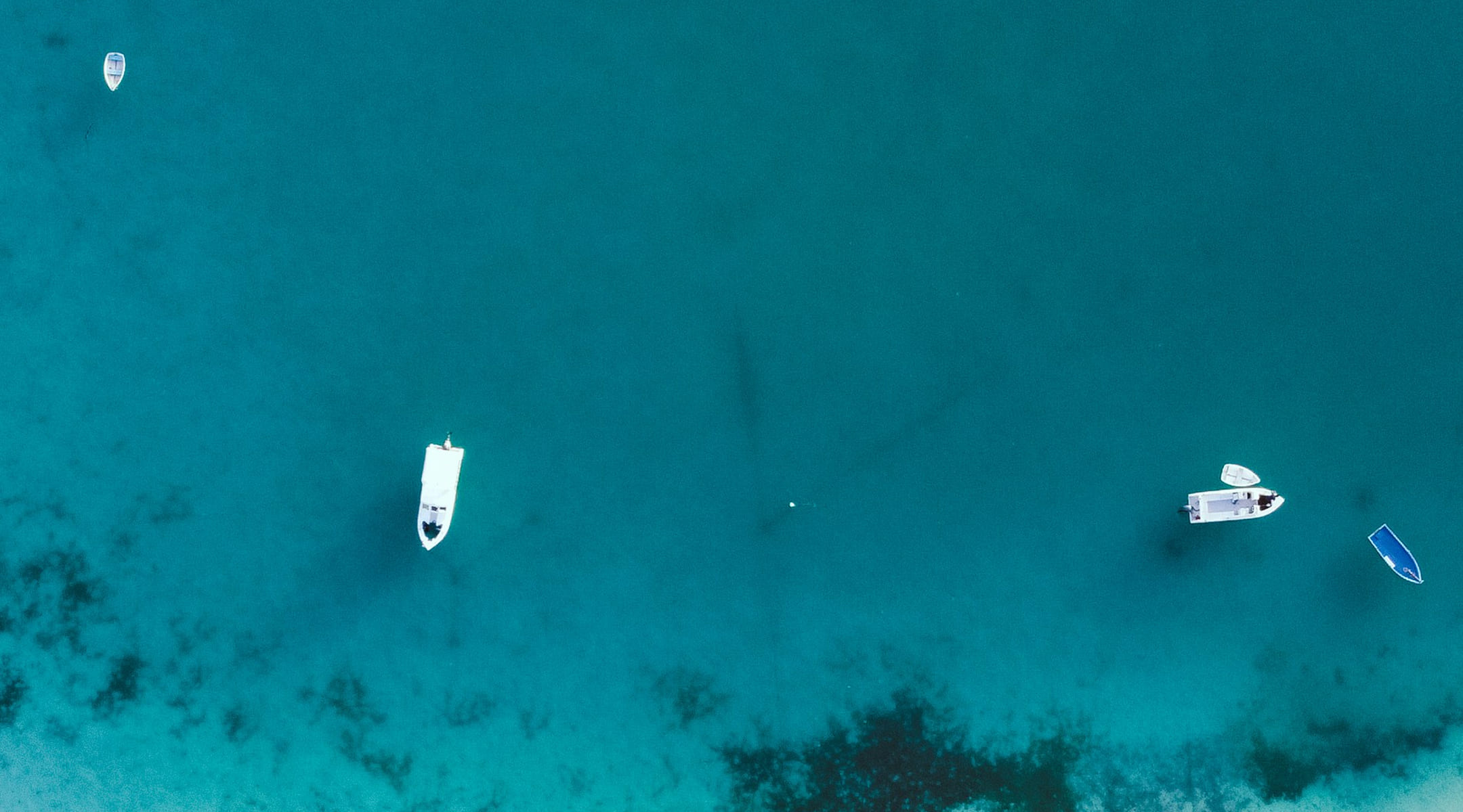 Aerial view of boats on turquoise water